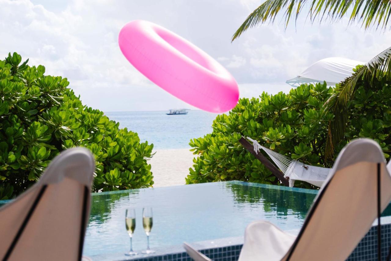 The Standard, Huruvalhi Maldives (Adults Only) Meedhoo  Exterior photo A poolside view of the beach