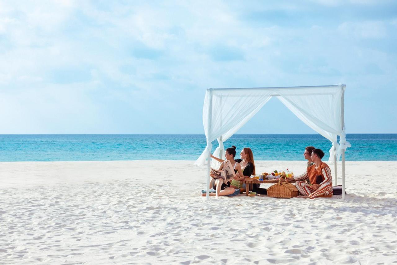 The Standard, Huruvalhi Maldives (Adults Only) Meedhoo  Exterior photo Beach at The Royal